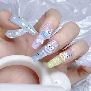 Close-up of monster nail design applied to five fingers with pastel background