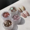 Glitter Explosion Nail Sequins with multi-sized iridescent flakes in clear pots