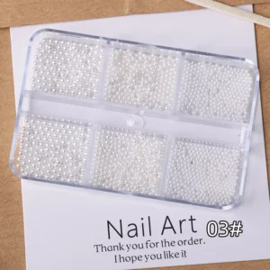 Milky transparent white nail pearls in assorted sizes