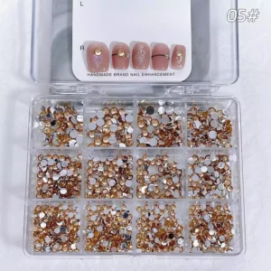 Flatback rhinestones in rich golden tones with sample nude nails
