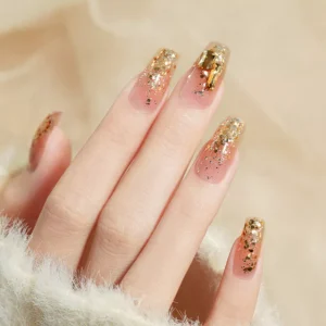 Gold glitter gradient manicure using Starry Glitter Gel Polish