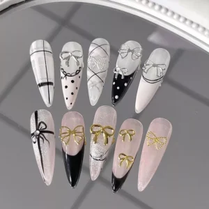 Metal Bow Nail Charms in gold and silver – nail tip display with bow styles