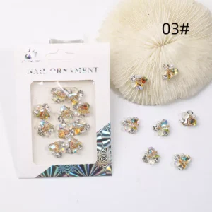Yellow-gold reflective heart-shaped nail charms with rhinestones