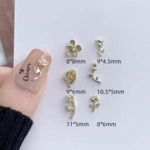 Assorted alloy floral nail charms in multiple sizes labeled with dimensions