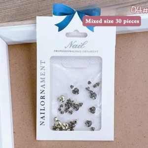 Smoky gray nail crystals displayed in clear front packaging