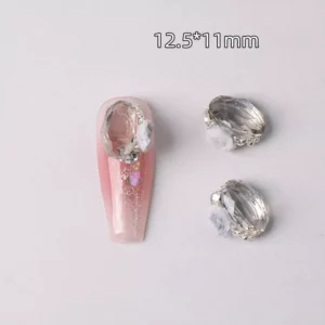 Clear oval nail gem with gray rose and icy rhinestones, 12.5x11mm