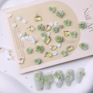 Green resin rose nail charms with luxury crystal embellishments and pearl details