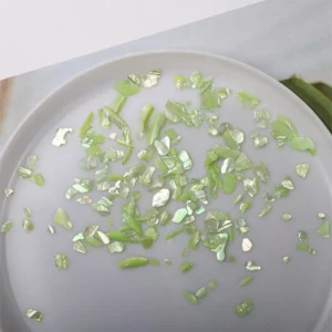 Light green abalone nail flakes with high iridescence