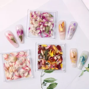 Handmade dried flower nail charms in vibrant colors for natural nail art