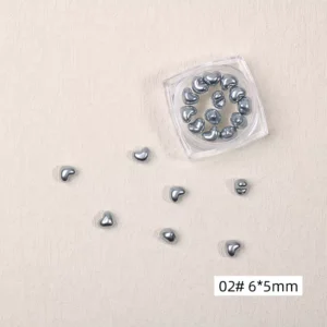 Silver heart nail decorations with glossy resin finish in 6×5mm size
