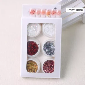 Holographic heart and star glitter jars arranged in display box with nail samples