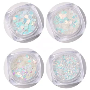 Holographic nail glitter flakes in heart, star, and shard shapes