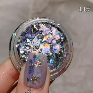 Stunning holographic nail flakes with purple, silver, and orange accents