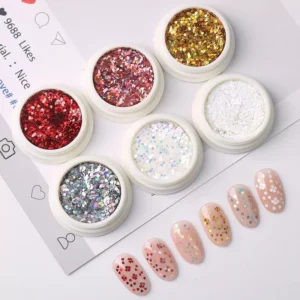 Heart glitter sequins in six shades, shown with full set of finished nude manicures
