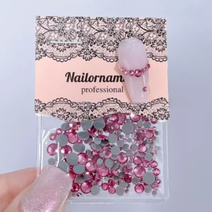 Hot pink flatback crystals with glossy faceting for nail art