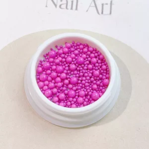 Fuchsia pink 3D nail caviar in mixed dimensions