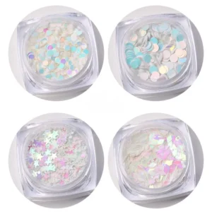 Assorted aurora nail sequins including round and heart shapes