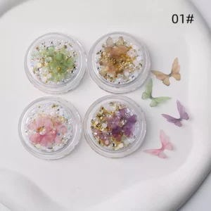 Iridescent butterfly nail charms in green, pink, purple, and gold set