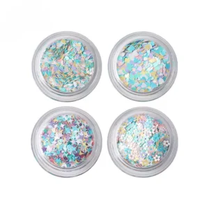 Four jars of mixed pastel iridescent nail sequins in abstract round shapes
