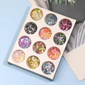 Holographic nail confetti neatly packed in a 12-grid display box