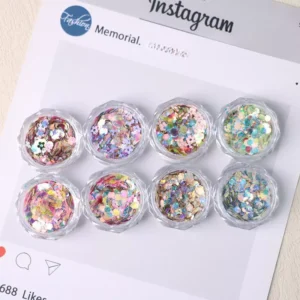 Floral iridescent glitter flakes in transparent jars with soft pastel tones