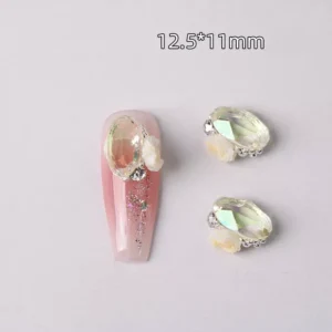 Iridescent oval icy stacked nail charm with ivory rose, 12.5x11mm
