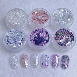 Iridescent and purple holographic nail glitter in circular and flake shapes