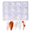 Iridescent rainbow nail sequins set with assorted holographic flakes in clear containers