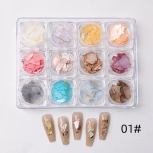 Assorted neutral-tone shell nail flakes in 12 compartments with beige nail art samples