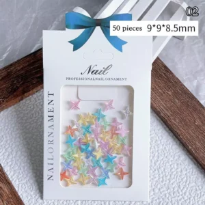 Product box with multicolor iridescent star nail charms, labeled 02