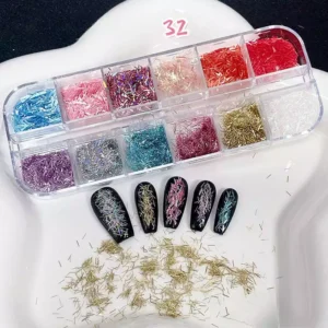 Mixed color shredded iridescent tinsel glitter for nail art, displayed with black nail tips