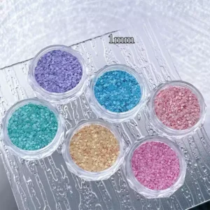 Iridescent star and heart glitter for vibrant nail art.