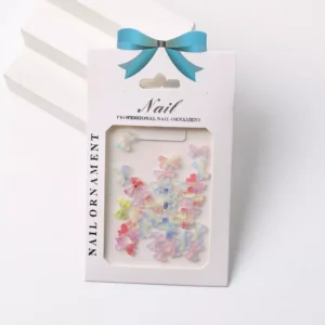 Translucent pastel rainbow bow nail charms with cute sheen