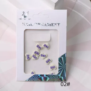 Lavender bow heart nail charms displayed in packaging with holographic trim (02#)