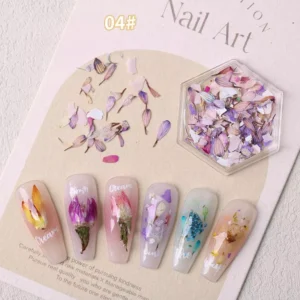 Lavender and ivory-toned dried flower shards in hexagonal box for nail art use