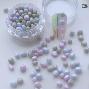 Iridescent pastel gray and lilac dopamine nail decorations in jar