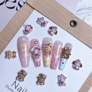 Mixed characters from Mikko Nail Charms scattered in white ceramic dish