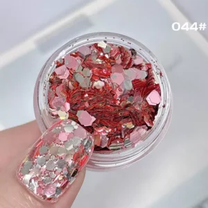 Red and silver glitter sequin mix for nail art with metallic foil texture