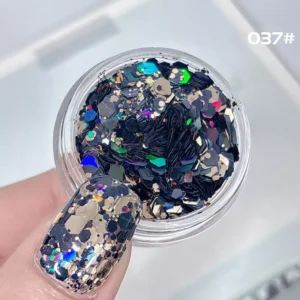 Midnight Galaxy hex glitter with black, gold, and holographic mix in clear jar and on nail