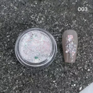 Milky pink opal nail glitter with scattered iridescent sequin accents