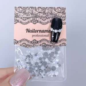 Matte white nail art crystals in flatback shape with soft glow