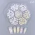 05 - Mini Daisy Charms – Resin + Rhinestone Center