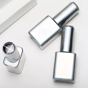 Three Colorful Gel Polish bottles arranged on white background