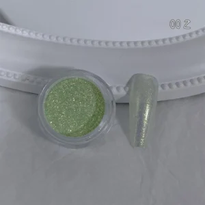 Green Starlight Glitter Nail Powder with reflective shimmer over swatch tip