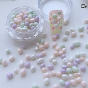Mixed pastel dopamine pearl pebbles in mint, lavender, and ivory