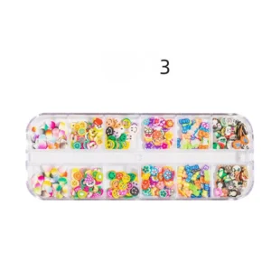 Box 3 of kawaii nail charms including emoji faces, cartoon figures, and fruits