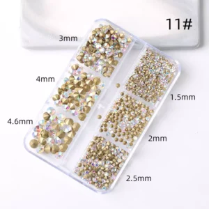 Variety of rhinestone colors and shapes in a nail art kit.