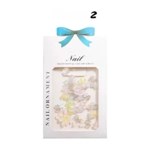 Assorted pastel 3D bow nail charms in retail packaging