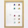 Moonlight Chrome Powder shade chart with framed color swatches on display