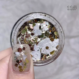 parkling gold, silver, and iridescent flakes for dazzling nail art